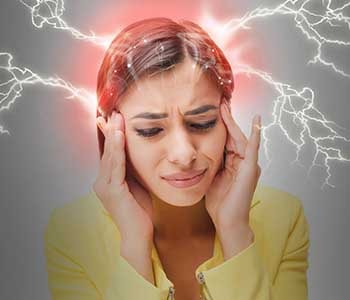 Woman with migraine