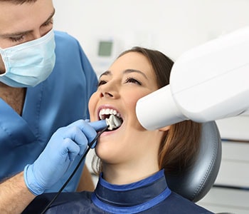 Young woman getting treated for gum disease