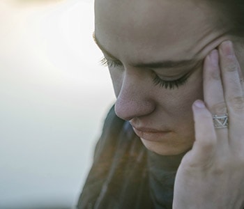 Woman with migraine