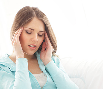 Woman suffering from a headache