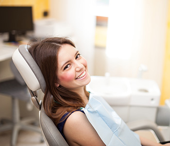 Happy young female patient