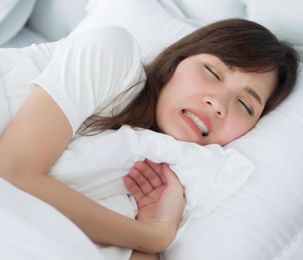 Young woman having trouble sleeping