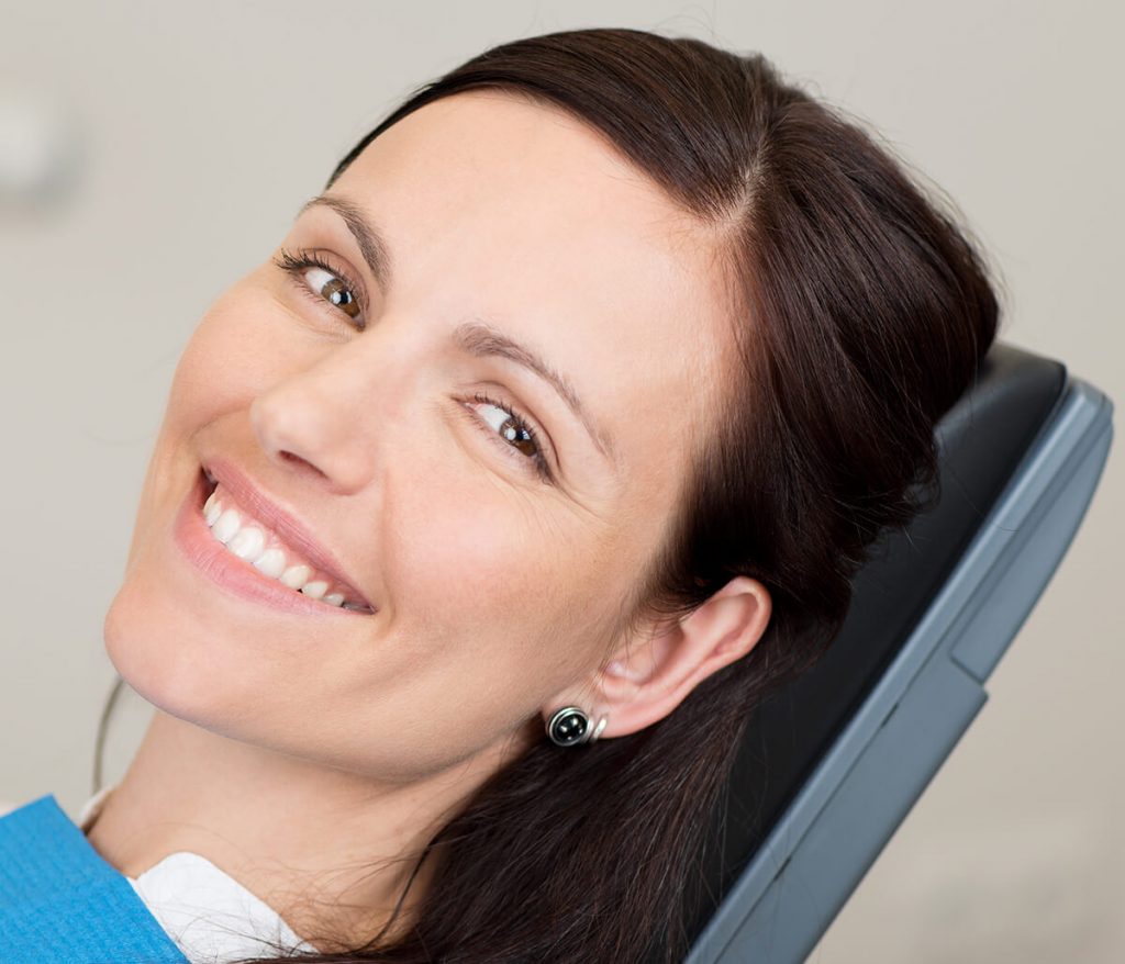 Middle-aged female patient smiling