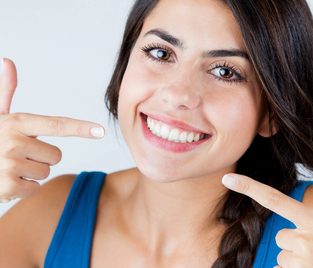 Woman smiling with perfect white teeth