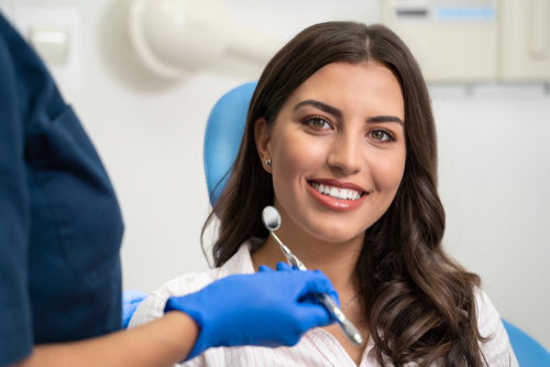 woman smiling at dental office